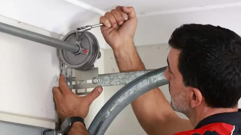 Snapped cable replacement - Garage Door Maintenance